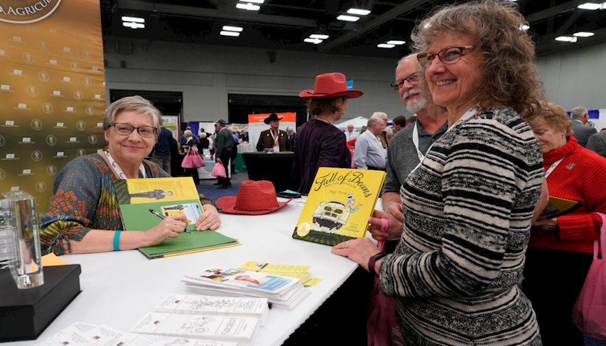 Louise and Scott Stoner with author Peggy Thomas